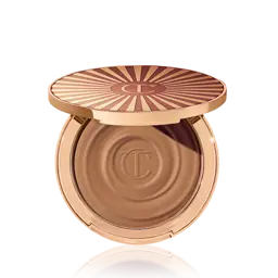 Show details for Charlotte Tilbury BEAUTIFUL SKIN SUN-KISSED GLOW BRONZER Picture of Charlotte Tilbury BEAUTIFUL SKIN SUN-KISSED GLOW BRONZER